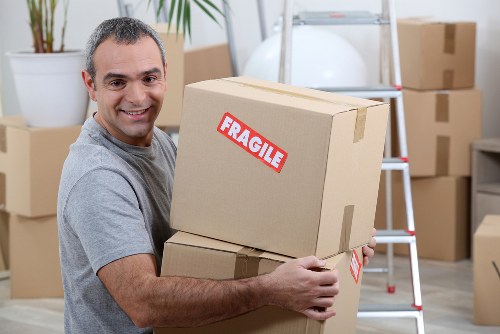 Careful loading of furniture and boxes by a local moving team
