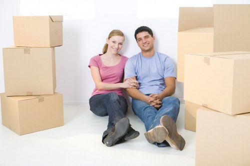 Packed boxes and furniture being loaded for a Catford home removal