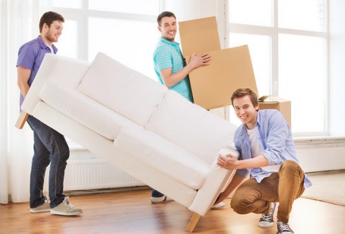 Packed boxes and furniture ready for transport
