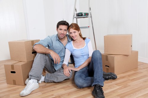 Van and helper at a residential property in Catford