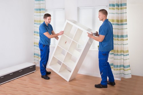 A local removals team managing loading during a business move in Catford